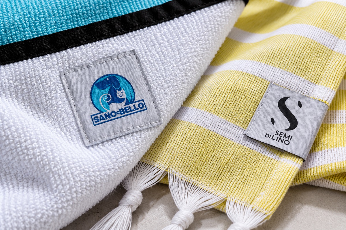 Custom woven labels sewn onto towels