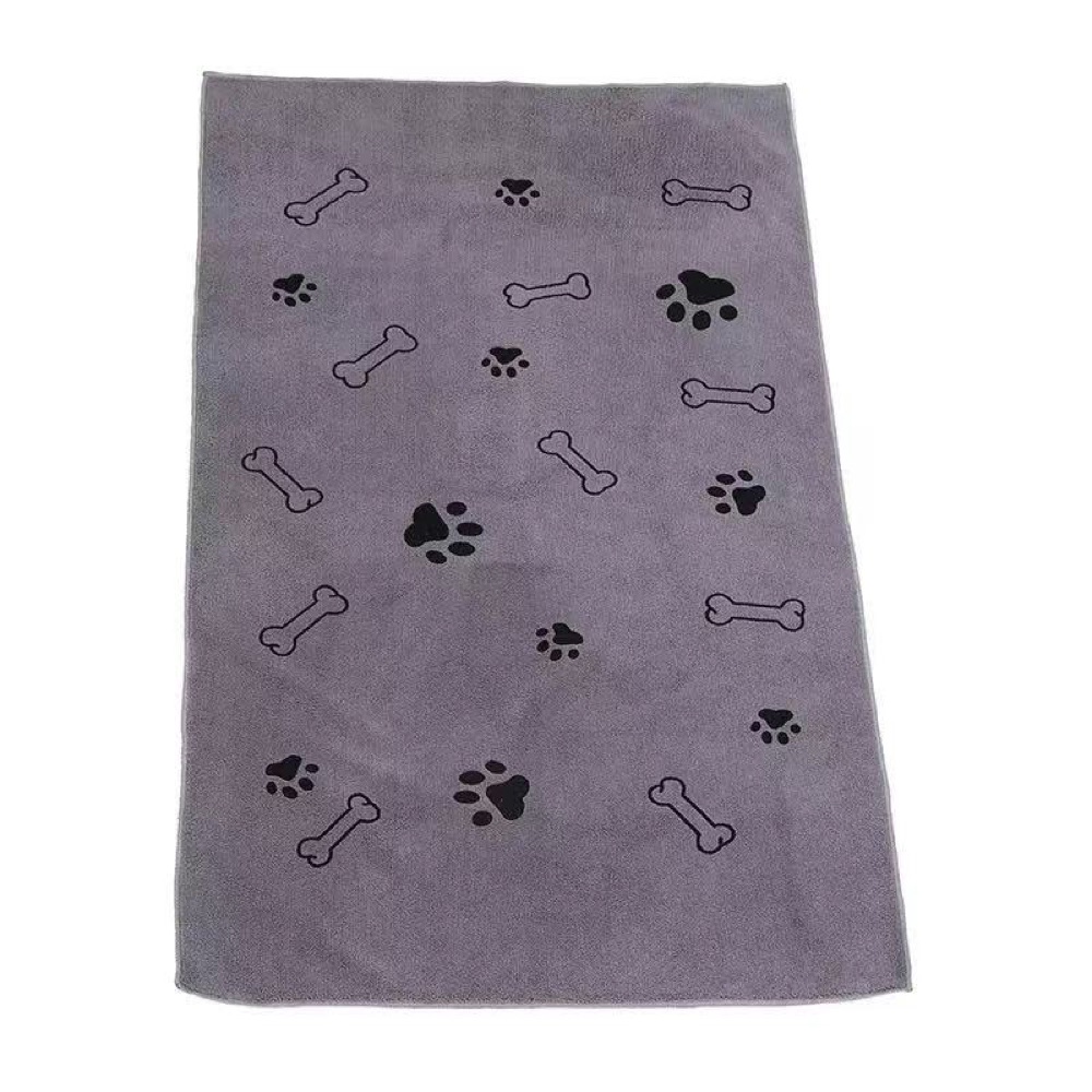Gray pet towel with paw and bone patterns on white