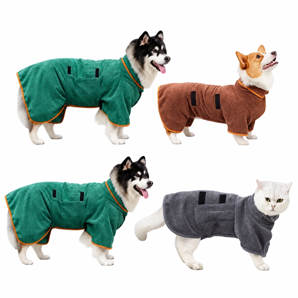 Dogs and a cat wearing adjustable pet bathrobes on white
