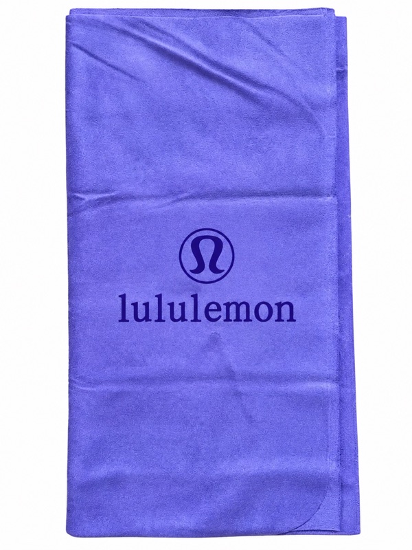 Purple sports towel with a dark printed logo on a white background