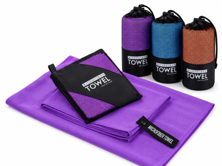 Purple microfiber towels with purple blue and orange mesh carry pouches