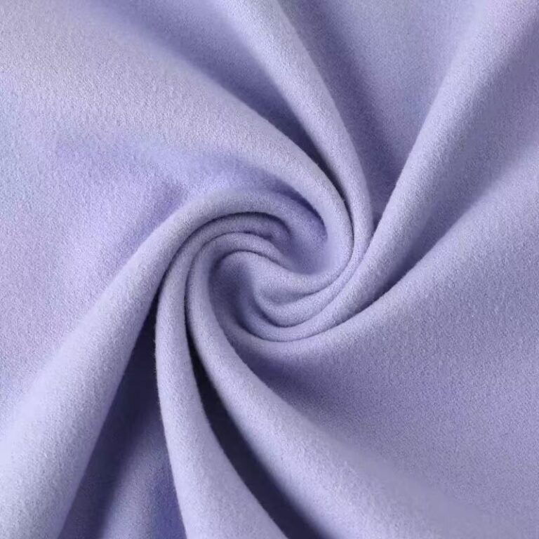 Lavender microfiber suede fabric arranged in spiral folds