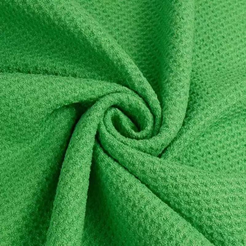 Green microfiber waffle fabric close-up