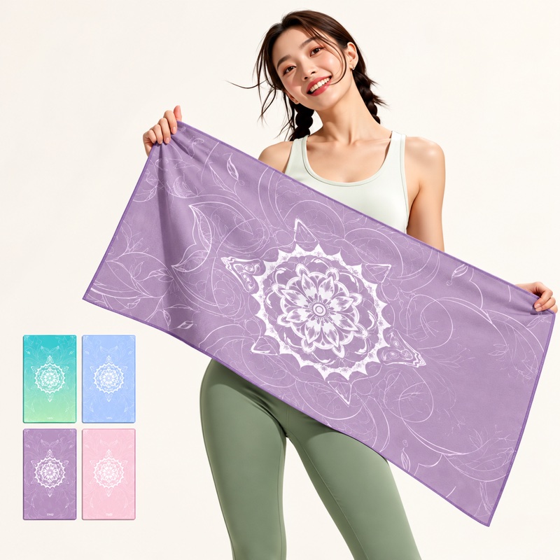 Woman displaying a purple patterned yoga towel