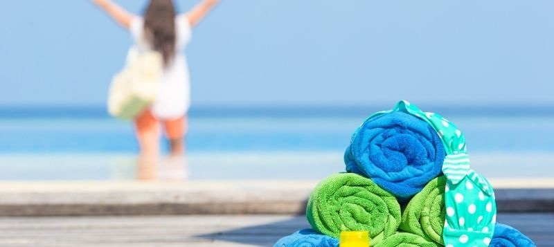 Colorful towels beside the sea
