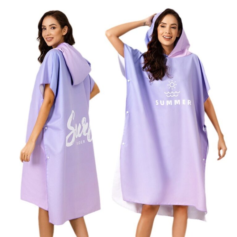 Adult wearing a lilac hooded changing poncho shown from front and back