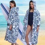 Asciugamano poncho da surf: la cura completa, la pulizia & Guida all'acquisto (2026)