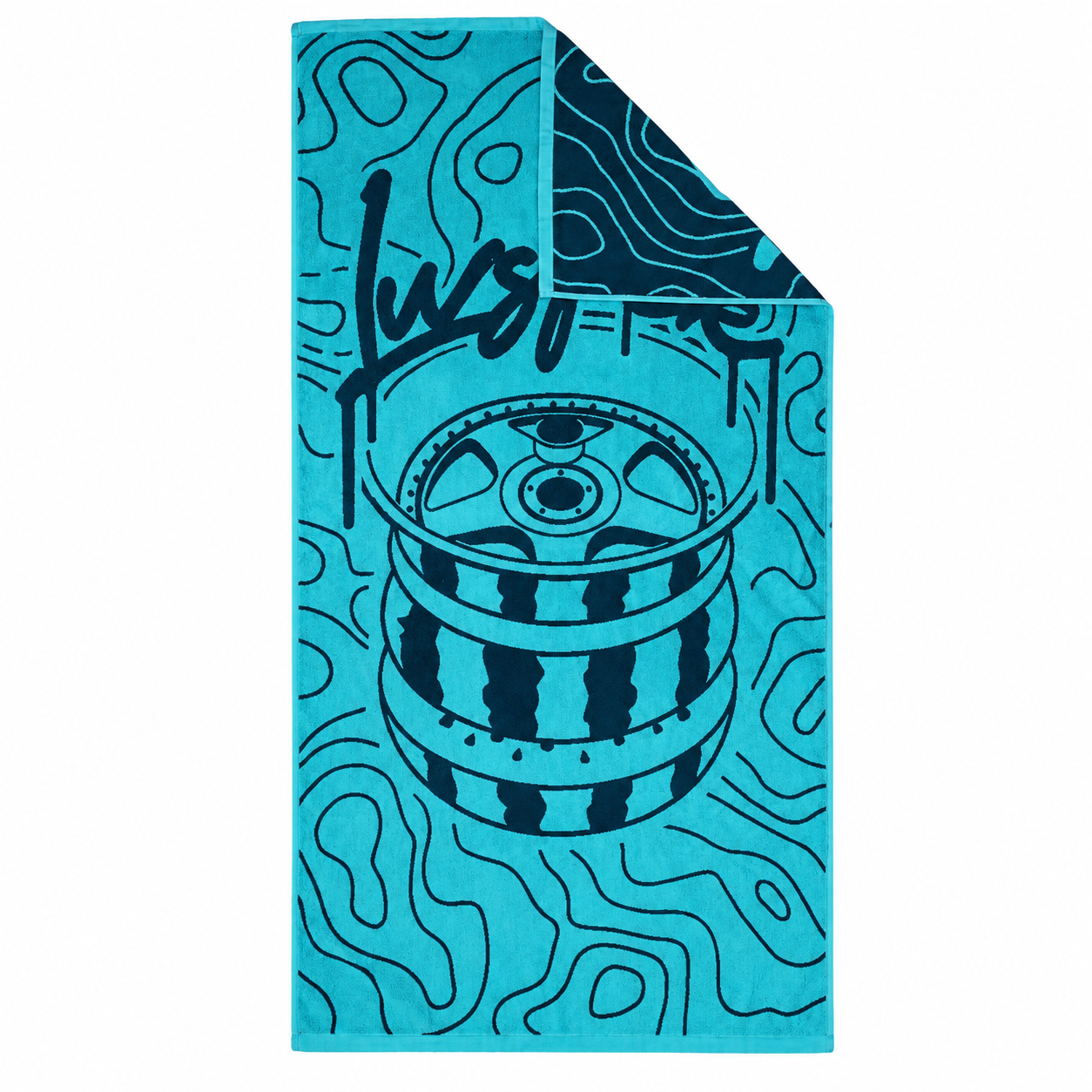 Single turquoise and navy yarn-dyed jacquard beach towel with a folded corner on white background